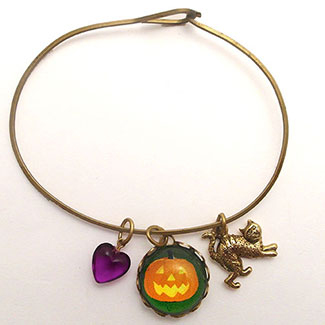 Jack O Lantern with Cat Charm and Purple Heart Bead Bracelet